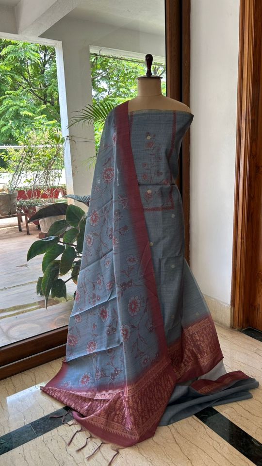 Elegant Woven Dress Material with Floral Motifs & Designer Border Dupatta
